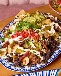 Azteca South Beach signature dishes Nachos MatadorChicken QuesadillaSpicy Chicken Bowl